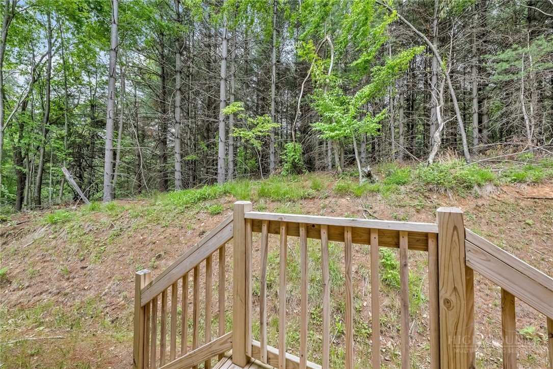939 Don Bare Road Jefferson, NC 28640 - Photo 46 of 49 a view of balcony with trees