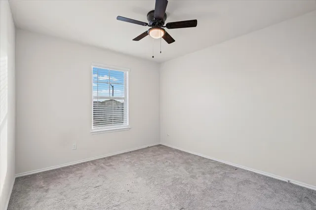 a bathroom with a sink toilet vanity tub and shower