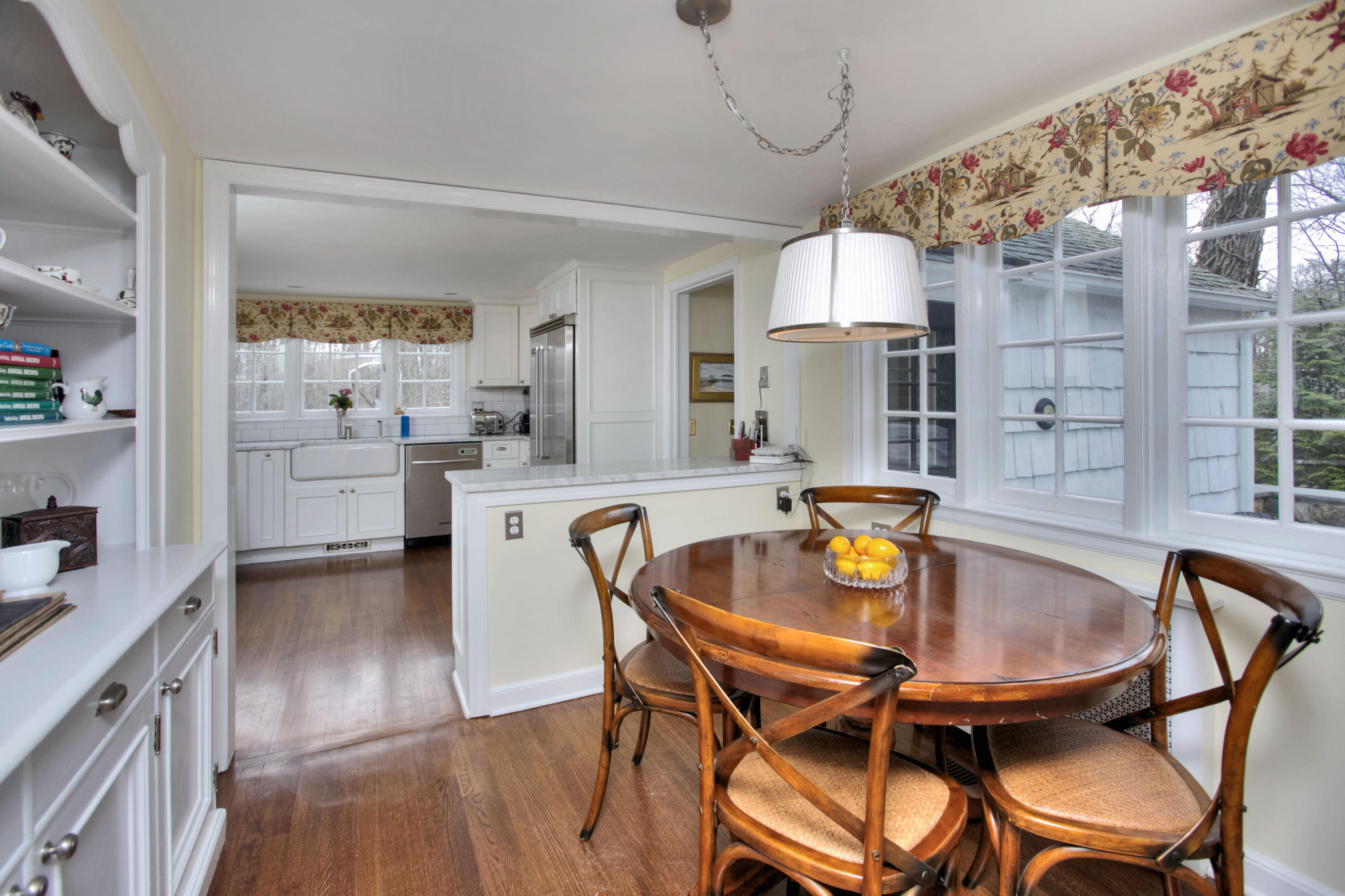 29 Stony Brook Road Darien, CT 06820 - Photo 11 of 24 a dining room with furniture and wooden floor