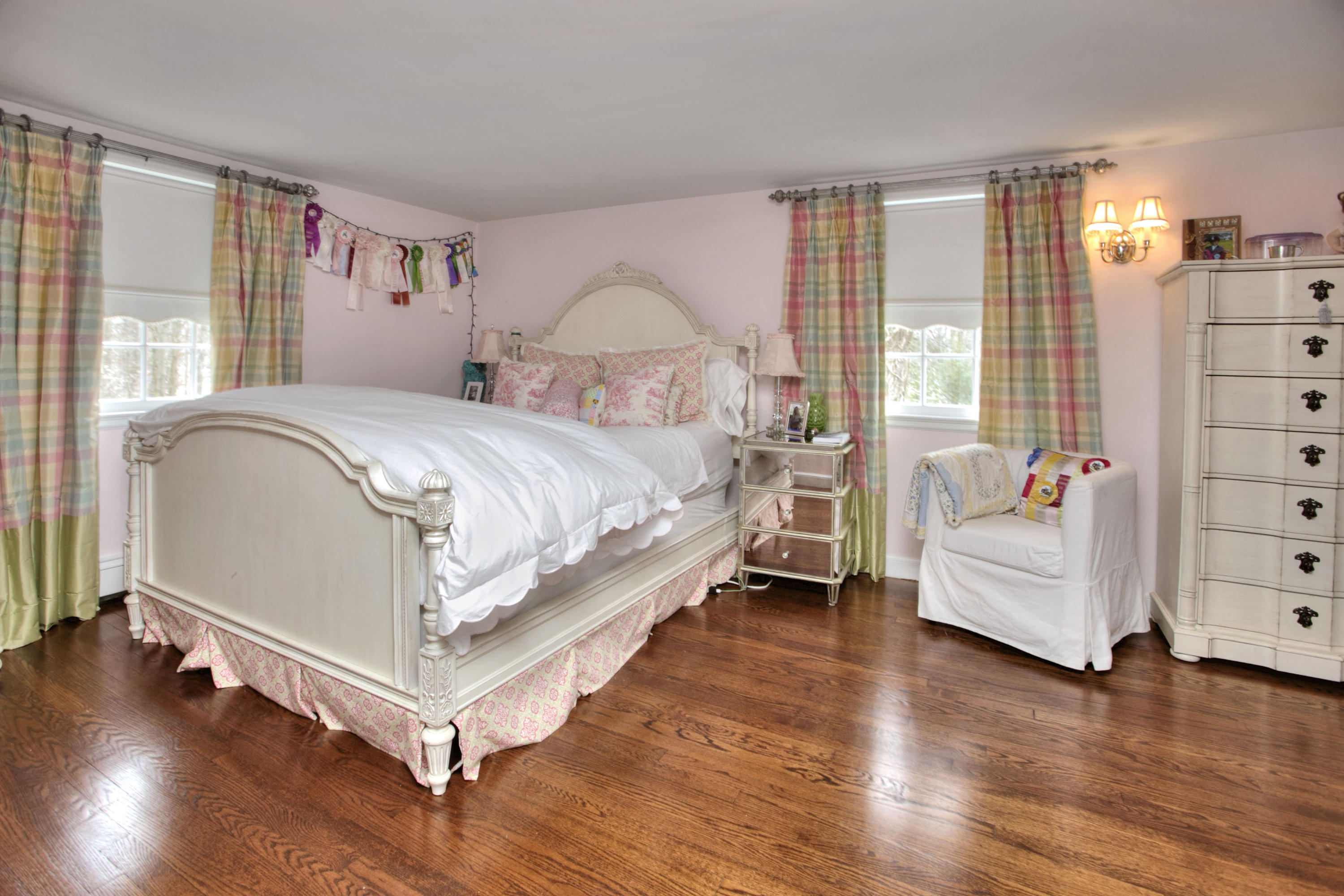 29 Stony Brook Road Darien, CT 06820 - Photo 19 of 24 a bed room with a bed and a chair