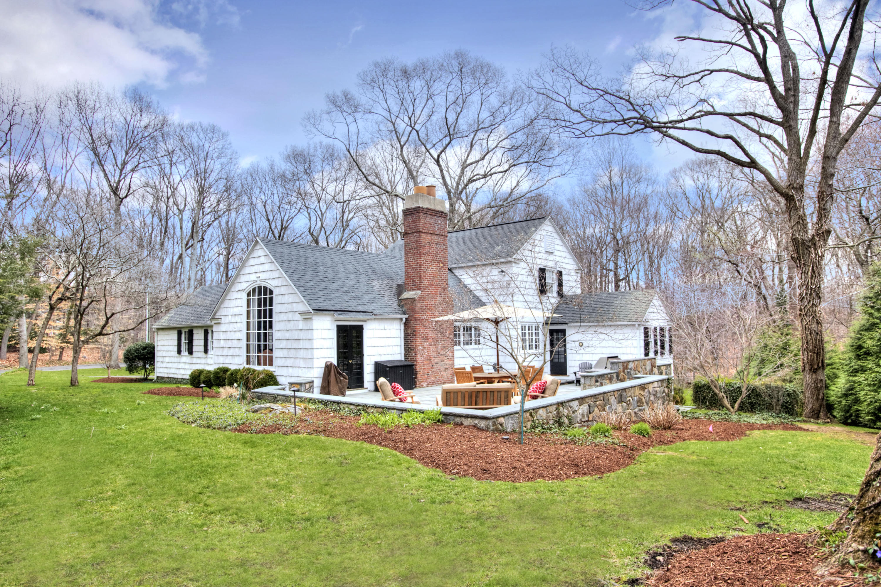 29 Stony Brook Road Darien, CT 06820 - Photo 2 of 24 a front view of house with yard