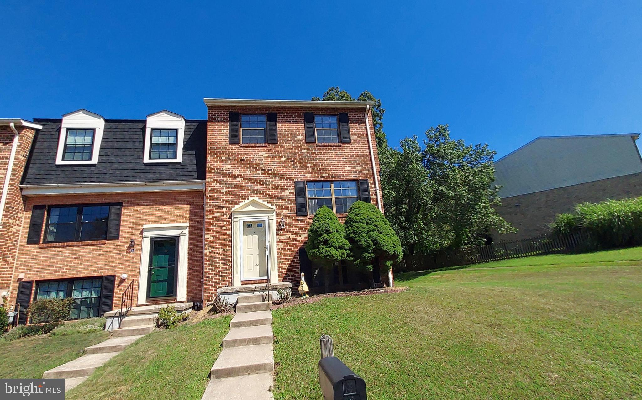 17 Kimball Ridge Court Catonsville, MD 21228 - Photo 2 of 5 a front view of a house with a yard