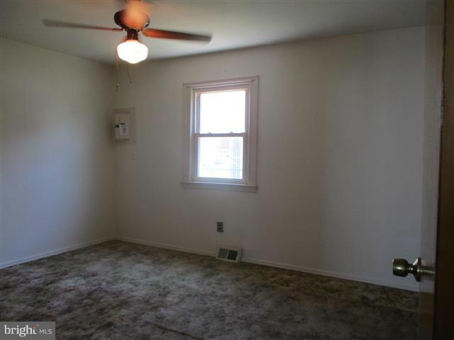 1717 Leslie Road Baltimore, MD 21222 - Photo 11 of 18 an empty room with a window