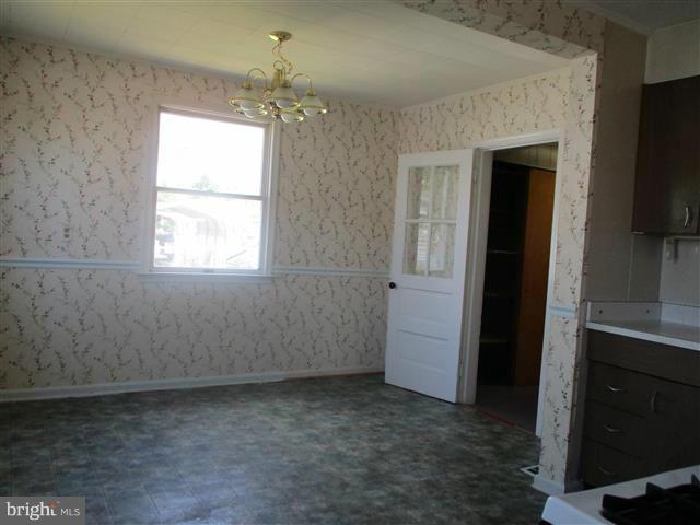 1717 Leslie Road Baltimore, MD 21222 - Photo 7 of 18 a view of livingroom with window