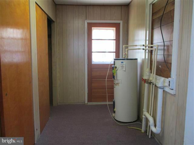 1717 Leslie Road Baltimore, MD 21222 - Photo 8 of 18 a view of water heater room