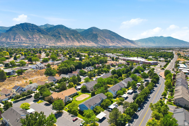 984 Independence Avenue Provo, UT 84604 - Photo 18 of 19 Expansive aerial perspective showcasing a residential community nestled against a mountainous backdrop
