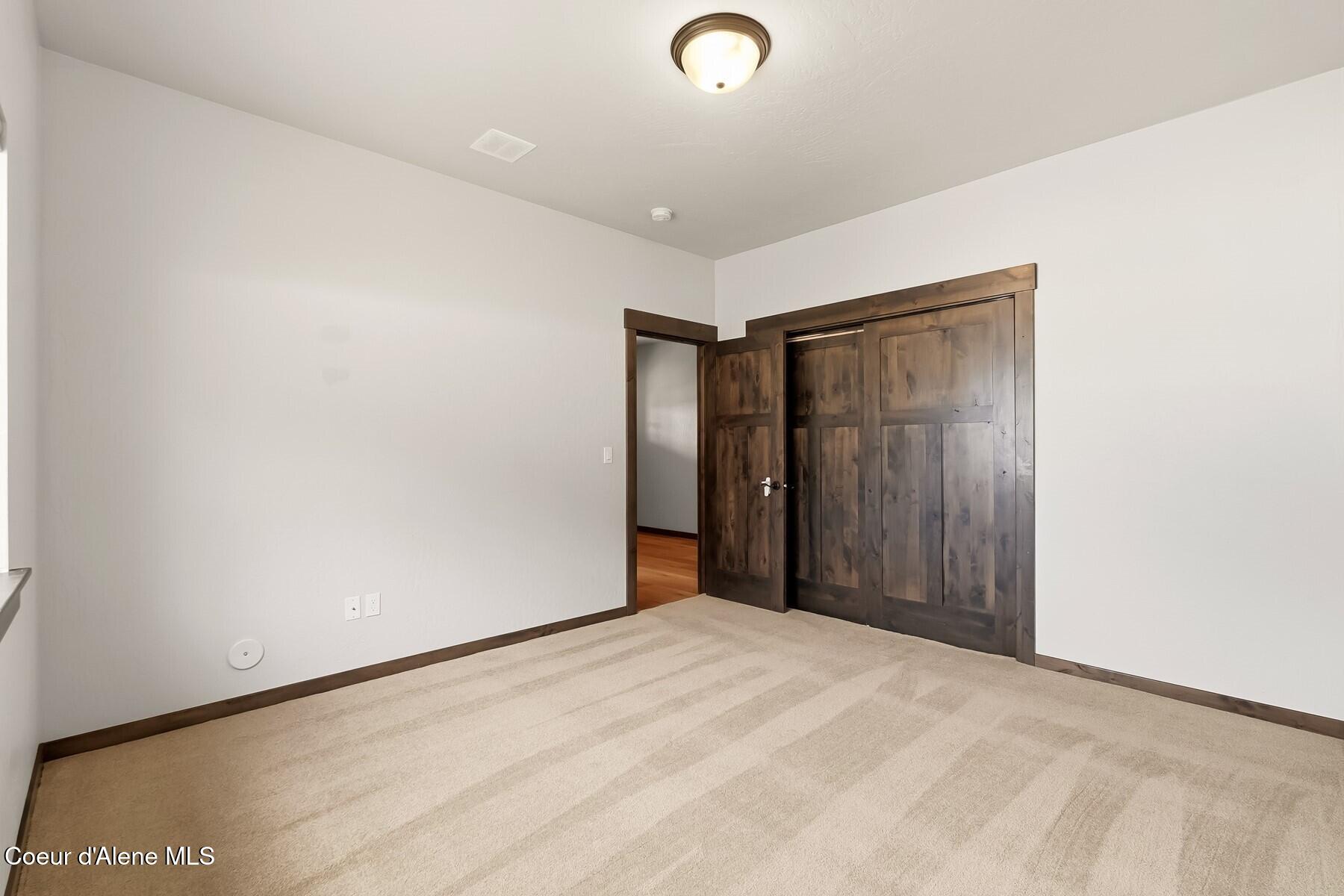 1317 Prominence Court Sandpoint, ID 83864 - Photo 27 of 44 Guest Bedroom #2 Closet