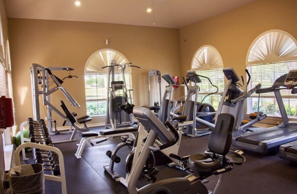 11518 Amber Canyon Drive Houston, TX 77095 - Photo 17 of 22 a view of a room with gym equipment