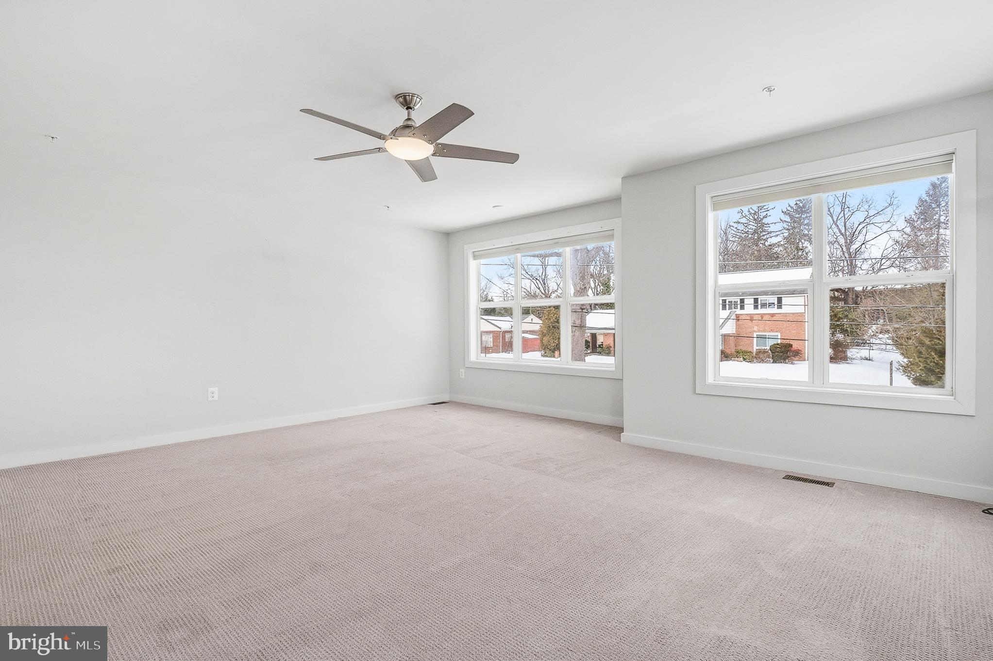 1910 Plyers Mill Road Silver Spring, MD 20902 - Photo 59 of 106 a view of an empty room with a window