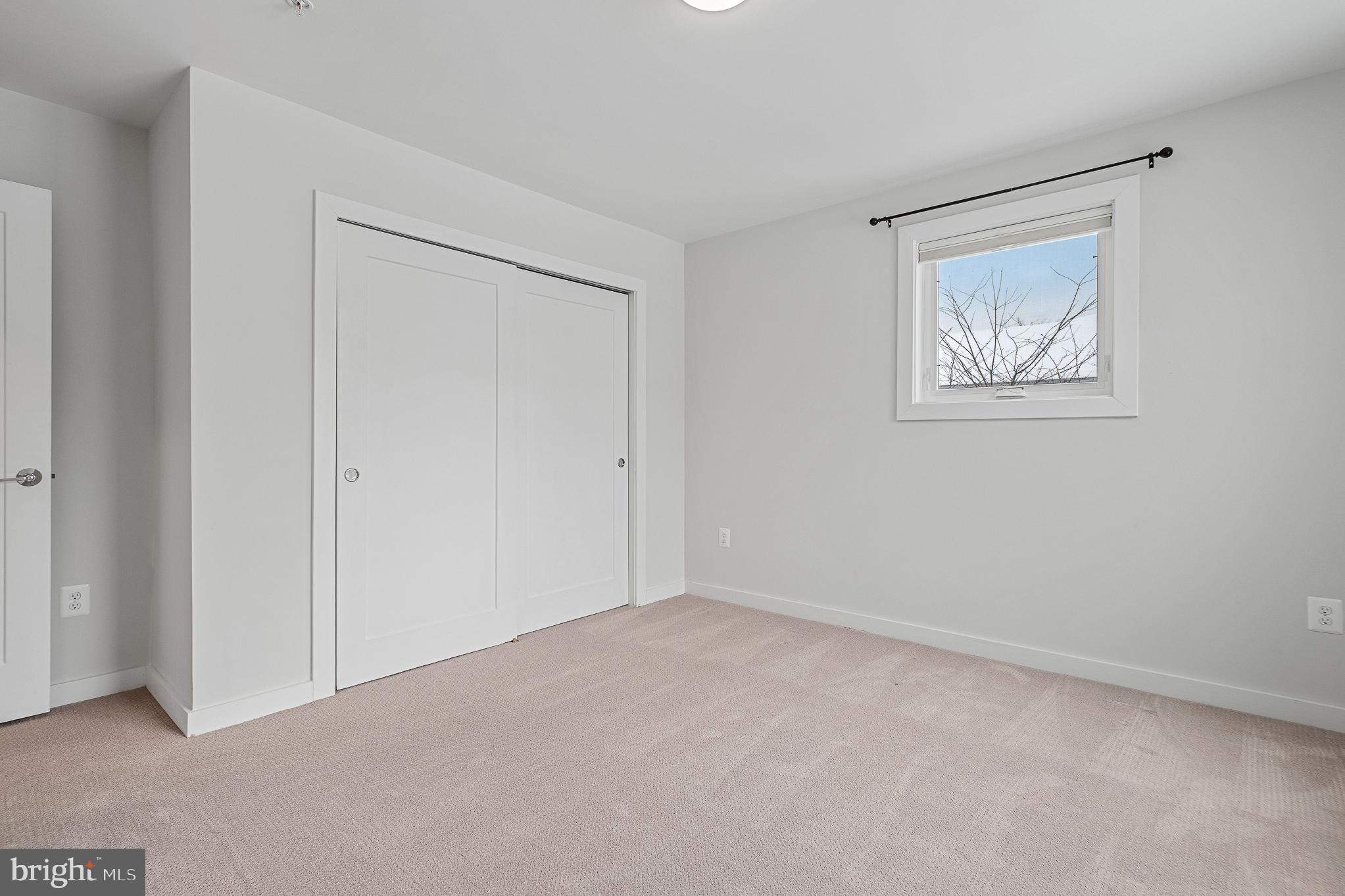 1910 Plyers Mill Road Silver Spring, MD 20902 - Photo 66 of 106 a view of an empty room with a window