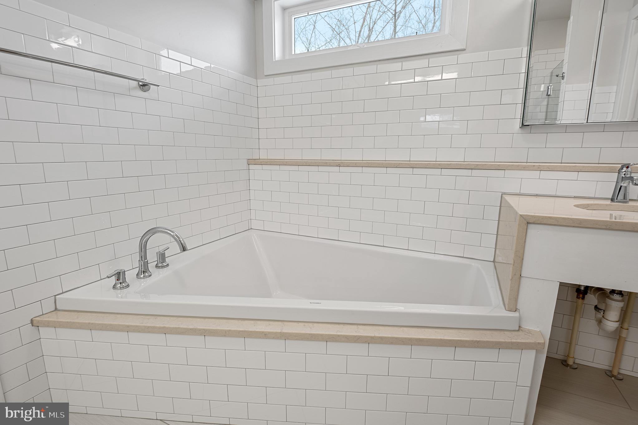 1910 Plyers Mill Road Silver Spring, MD 20902 - Photo 84 of 106 a bathroom with a sink and a shower