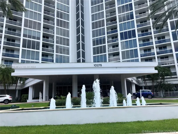 a view of a building with a garden