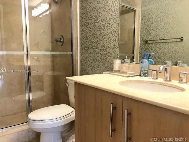 a bathroom with a sink and a toilet