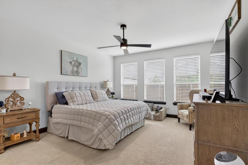 1740 Reverie Road Burleson, TX 76028 - Photo 27 of 37 a bedroom with a bed furniture and a window