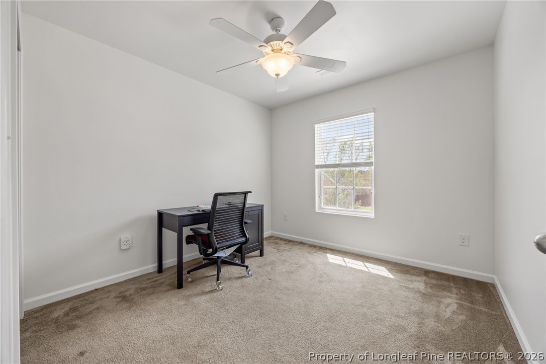 226 River Oak Street Spring Lake, NC 28390 - Photo 30 of 41 a workspace with furniture and a window