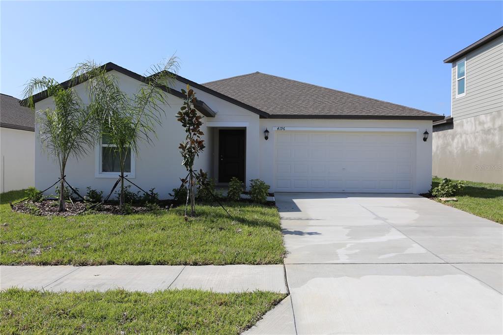 4196 Singing Mockingbird Boulevard Bartow, FL 33830 - Photo 1 of 1 a view of a house with a yard
