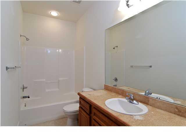 15284 331 Business, Unit 10D Freeport, FL 32439 - Photo 6 of 8 a bathroom with a sink a toilet and shower