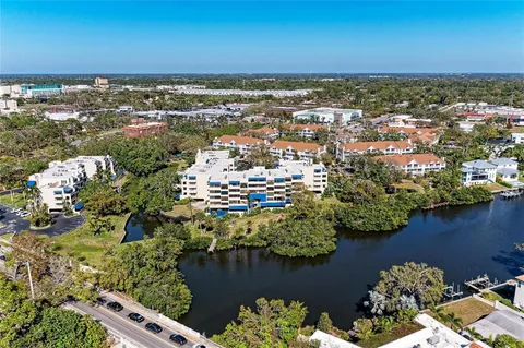 a view of a pathway with a garden