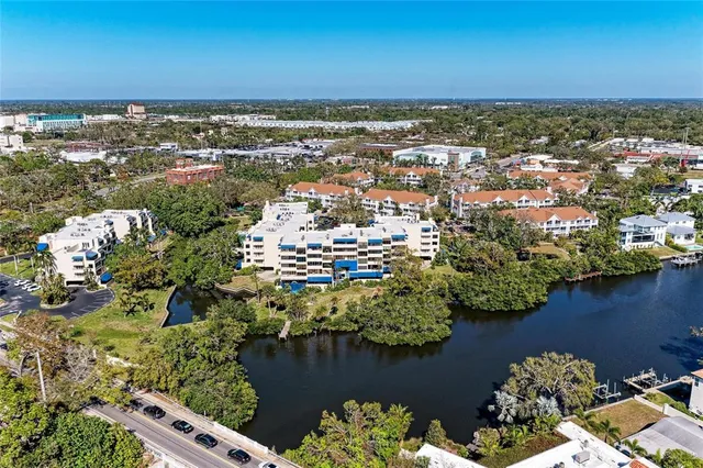 a view of a pathway with a garden