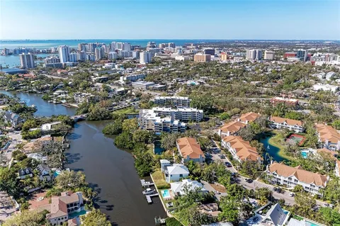 a close up of a pool table and chairs in patio
