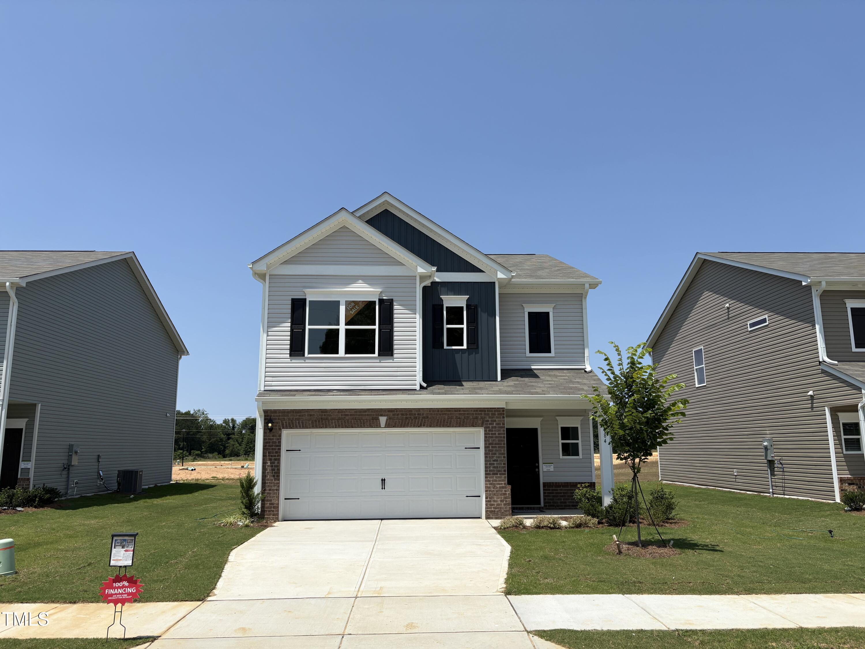 a front view of house with yard