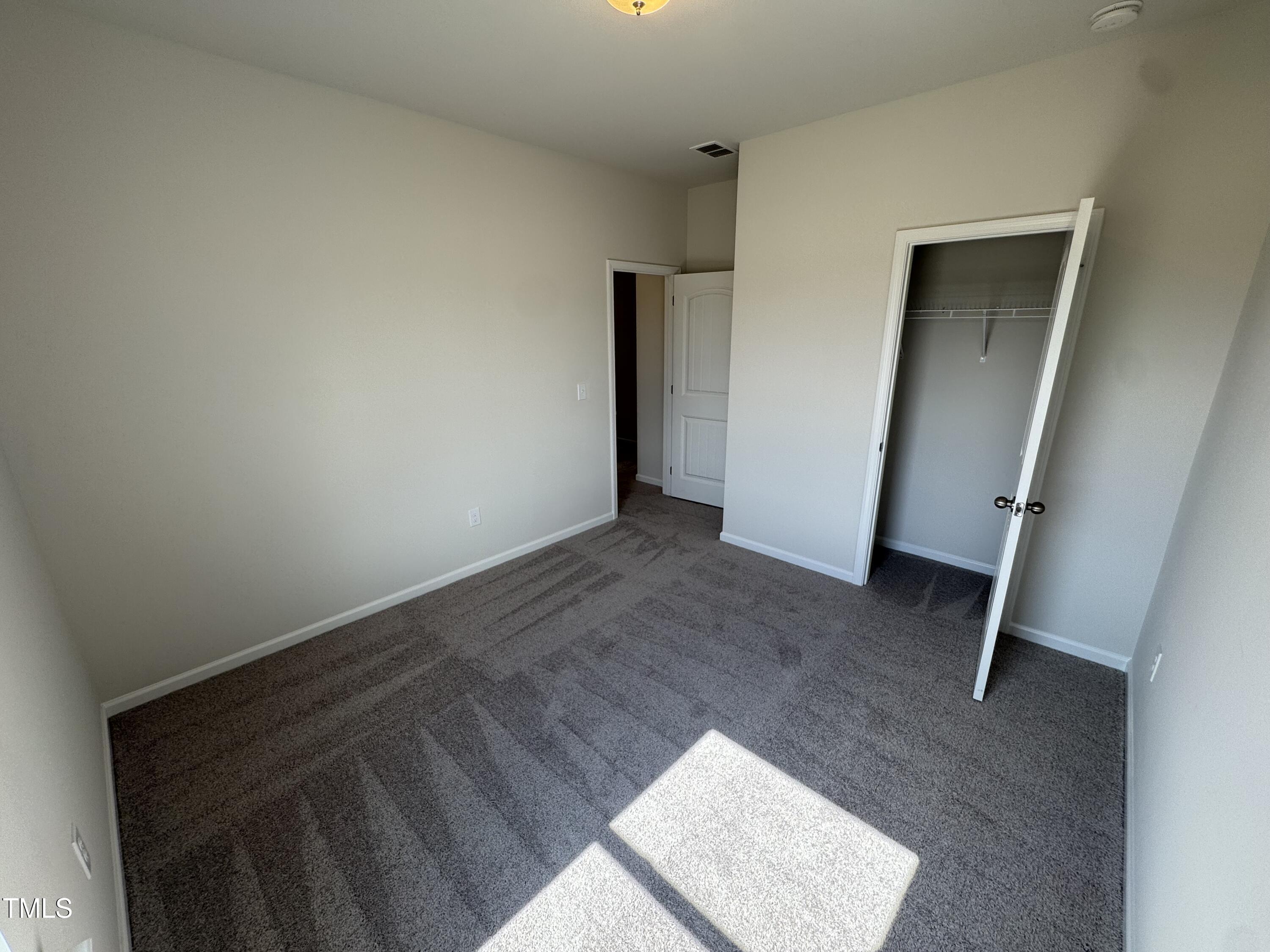 184 Bruce Drive Dunn, NC 28334 - Photo 18 of 32 an empty room with an empty space