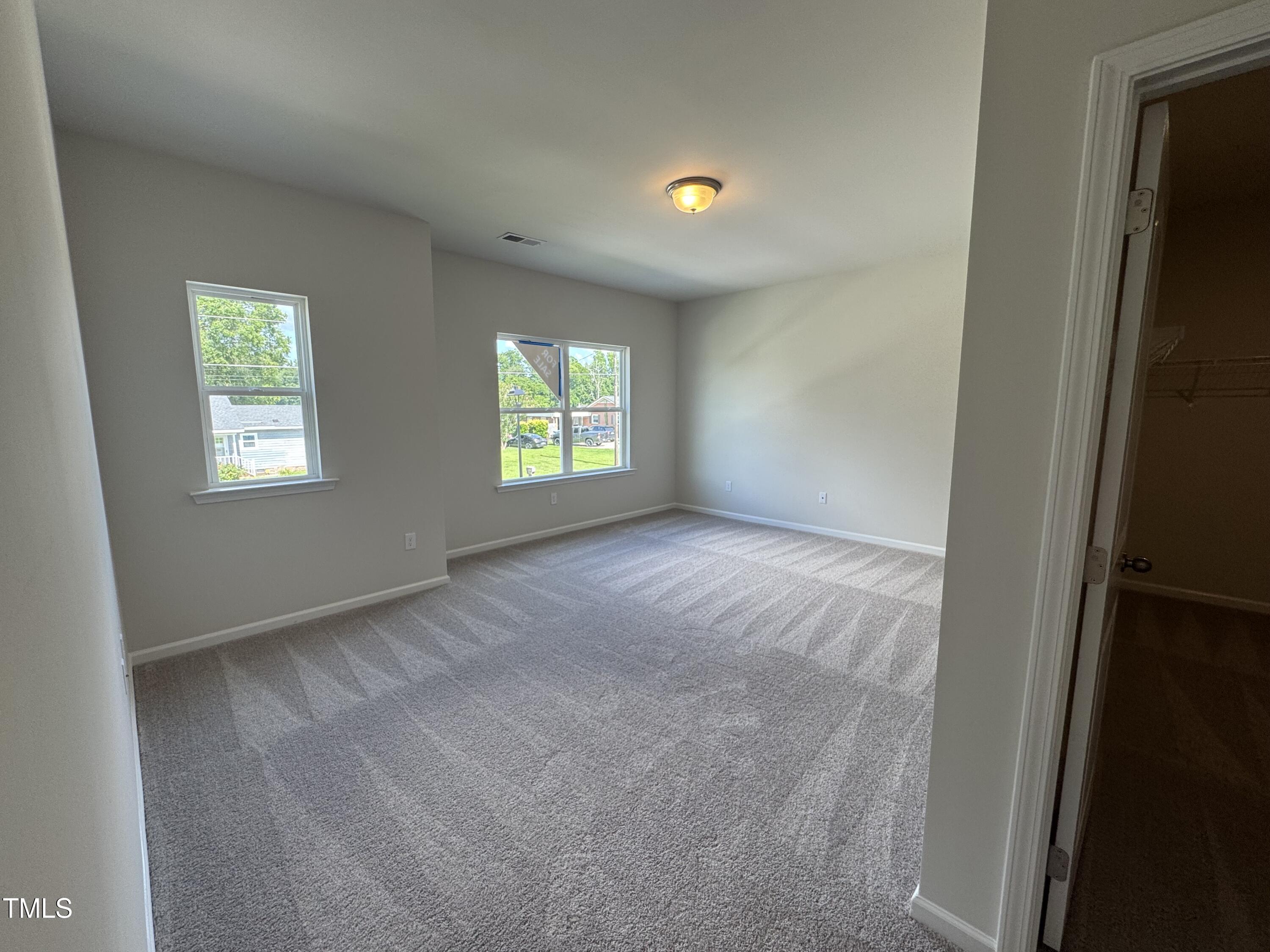 184 Bruce Drive Dunn, NC 28334 - Photo 24 of 32 a view of an empty room with a window