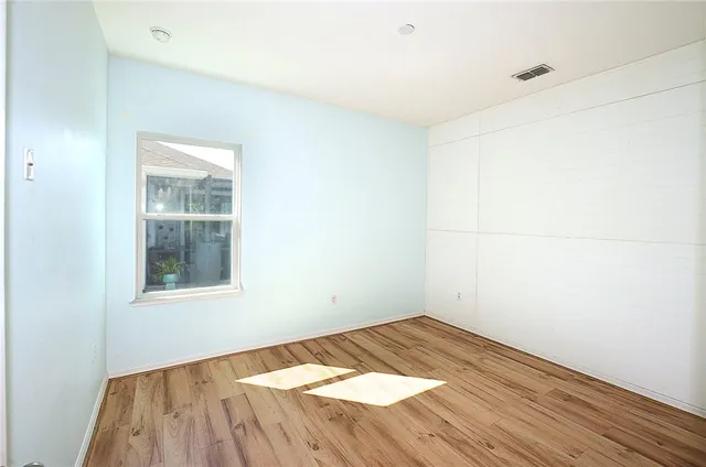 a view of a room that has a window in it