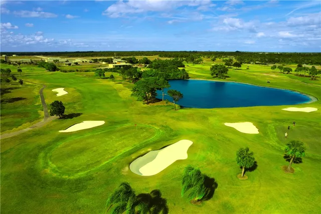 a view of swimming pool with a yard