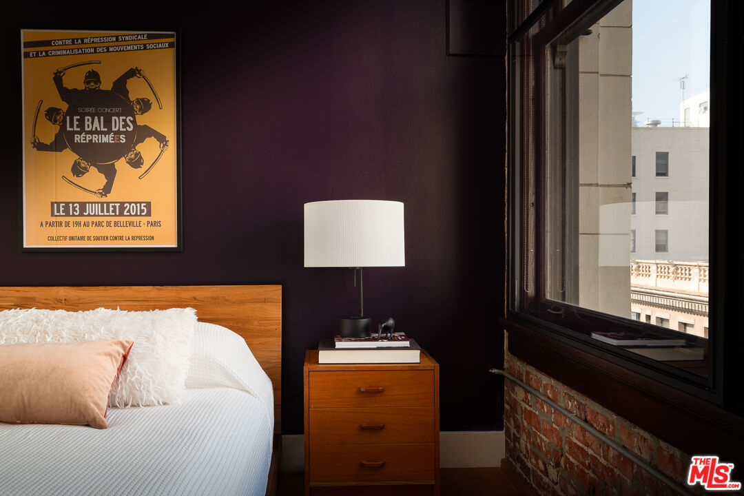460 South Spring Street, Unit 1015 Los Angeles, CA 90013 - Photo 11 of 50 a bathroom with a sink and a mirror