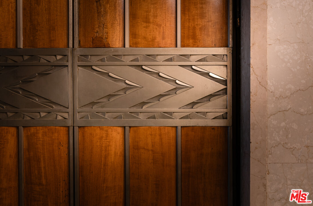 460 South Spring Street, Unit 1015 Los Angeles, CA 90013 - Photo 35 of 50 a close view of a refrigerator a sink and a window