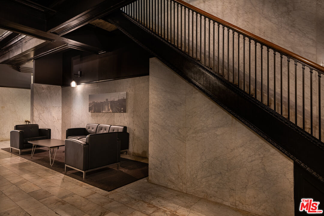 460 South Spring Street, Unit 1015 Los Angeles, CA 90013 - Photo 39 of 50 a living room with furniture