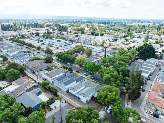 an aerial view of a city with lots of residential buildings