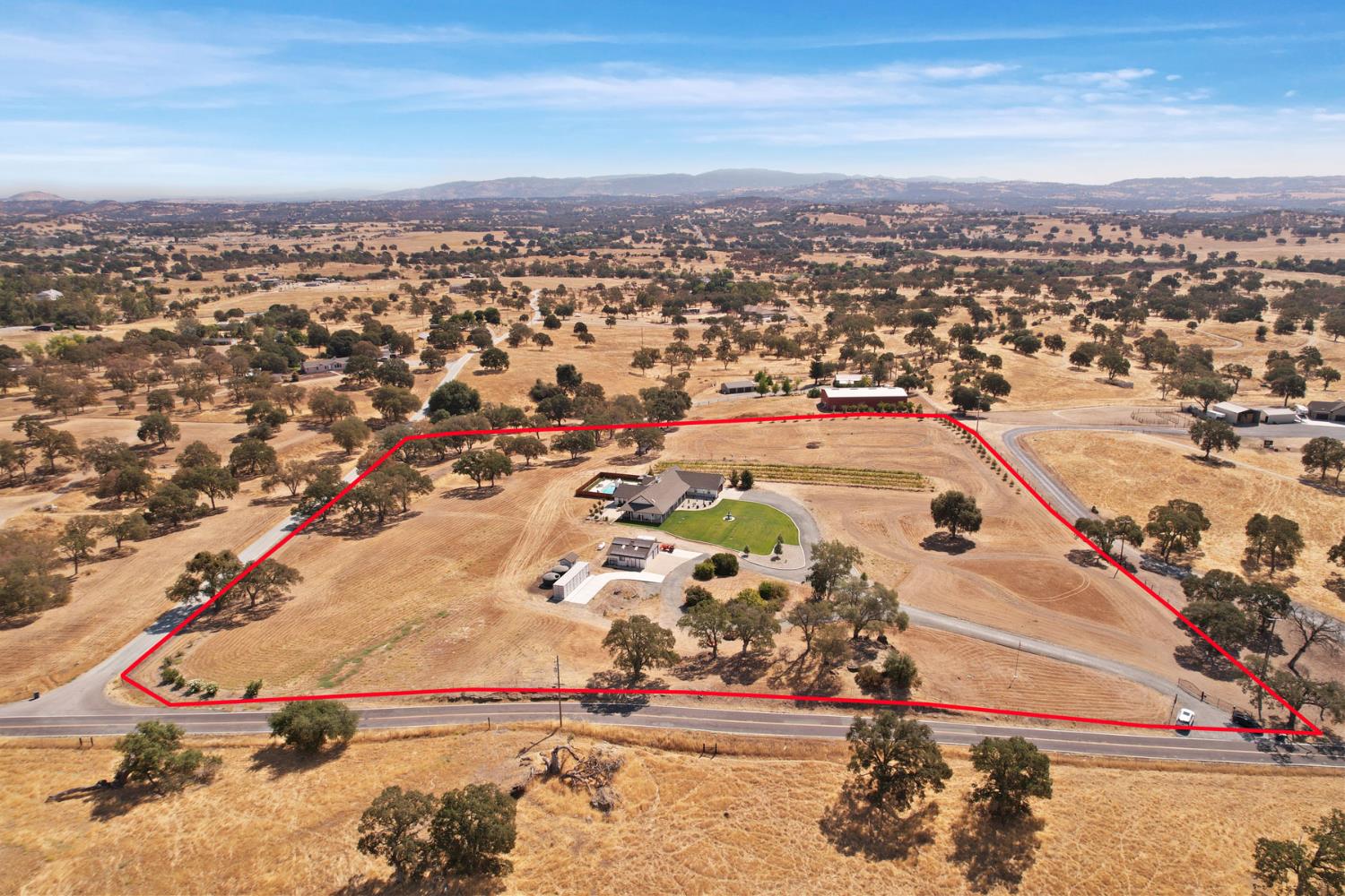 8779 Ospital Road Valley Springs, CA 95252 - Photo 14 of 80 an aerial view of a city