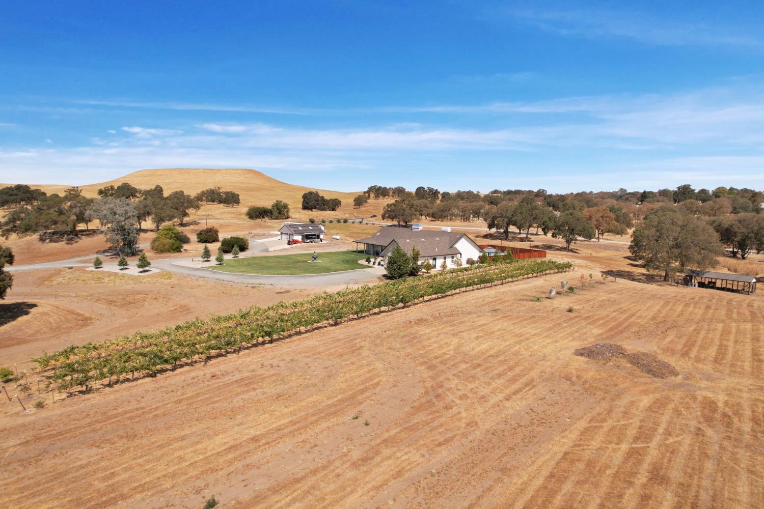 8779 Ospital Road Valley Springs, CA 95252 - Photo 20 of 80 a view of a road with an ocean view