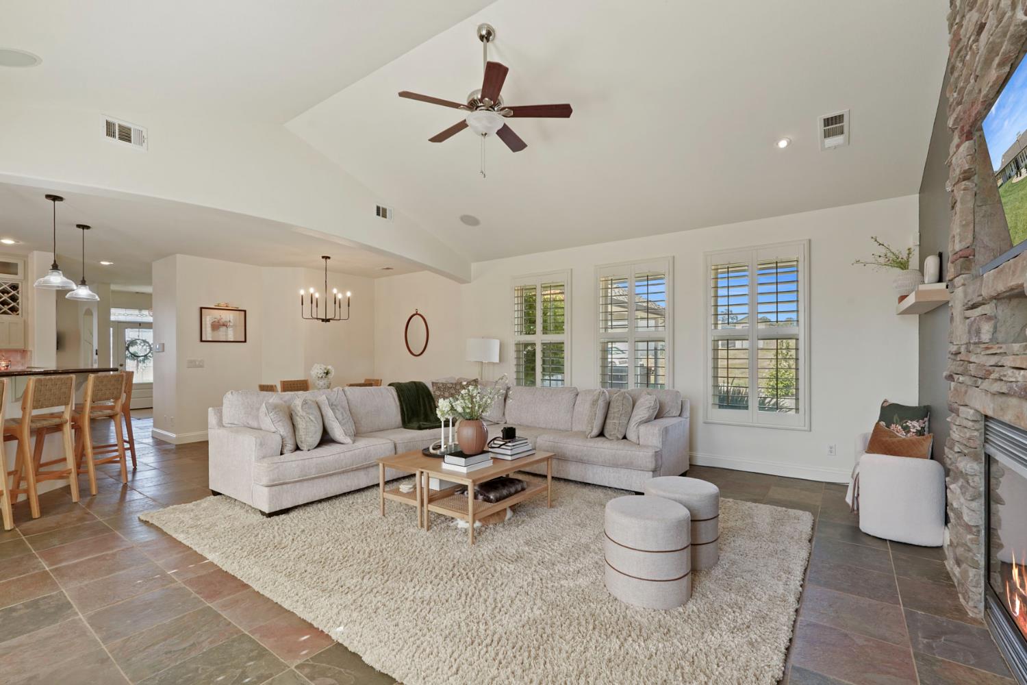 8779 Ospital Road Valley Springs, CA 95252 - Photo 30 of 80 a living room with furniture and a large window