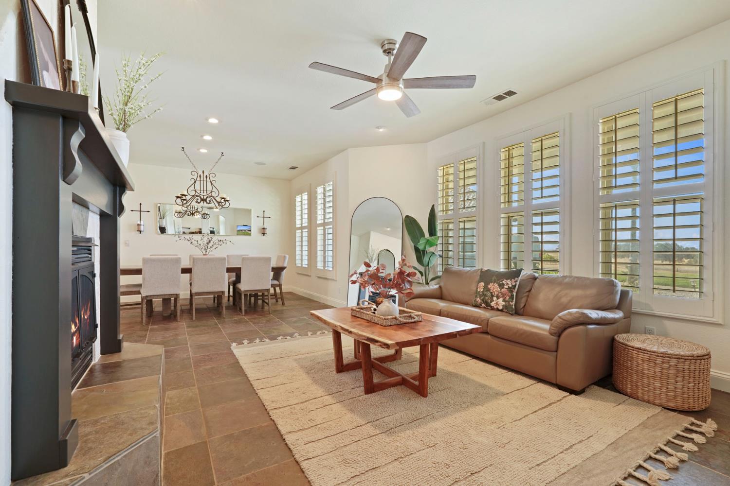 8779 Ospital Road Valley Springs, CA 95252 - Photo 35 of 80 a living room with furniture and a large window