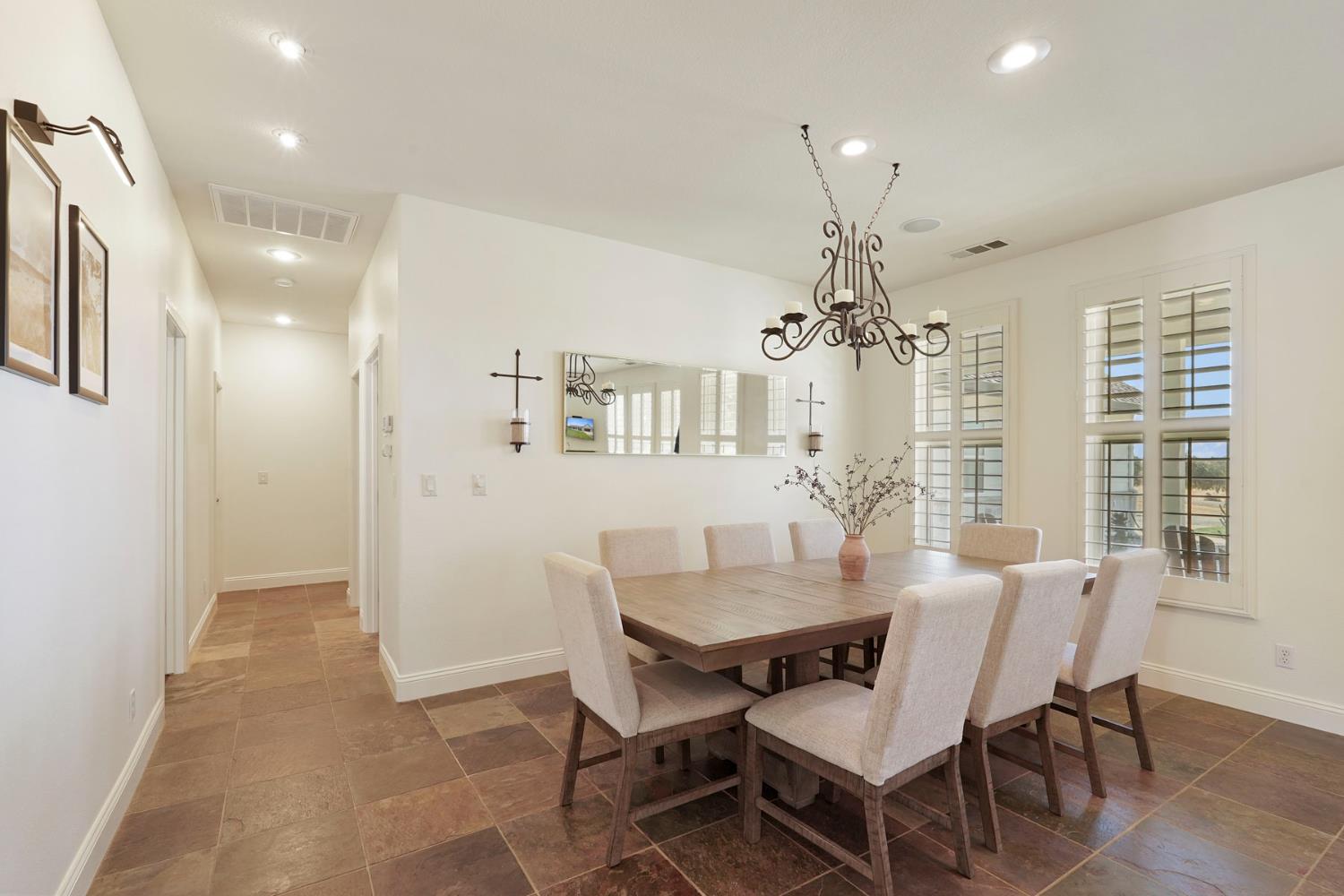 8779 Ospital Road Valley Springs, CA 95252 - Photo 38 of 80 a dining room with furniture and window