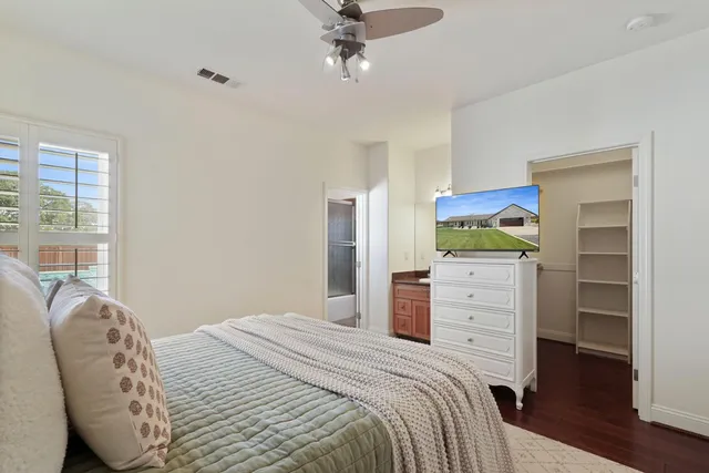 a spacious bathroom with a double vanity sink mirror and