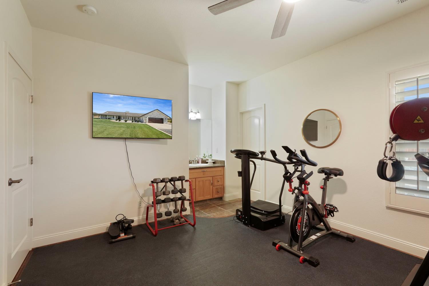 8779 Ospital Road Valley Springs, CA 95252 - Photo 50 of 80 a view of a room with gym equipment