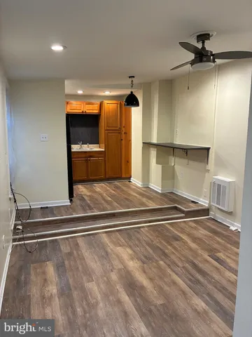 a view of a refrigerator in kitchen