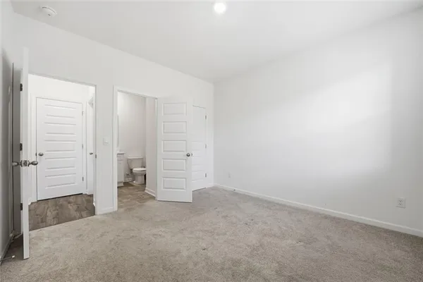 an empty room with a bench