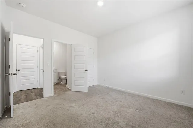 an empty room with a bench