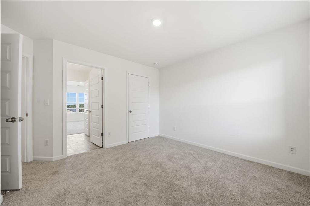 469 Ralph Still Road Dacula, GA 30019 - Photo 21 of 42 a view of an empty room