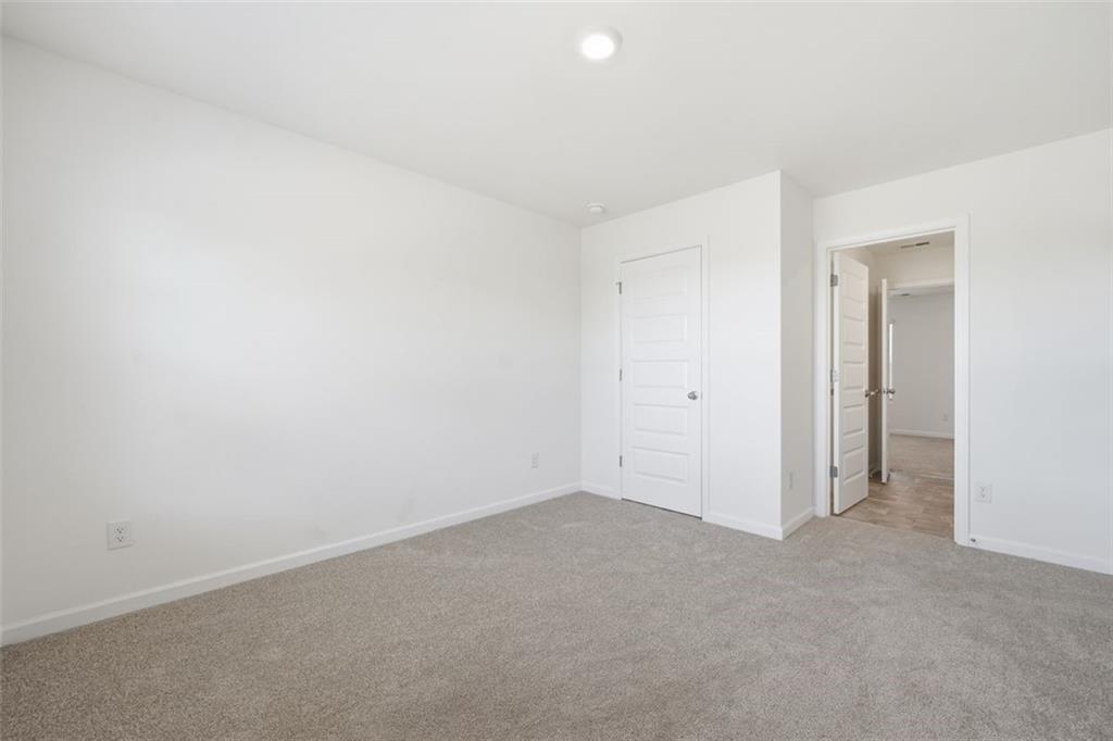 469 Ralph Still Road Dacula, GA 30019 - Photo 25 of 42 a view of an empty room