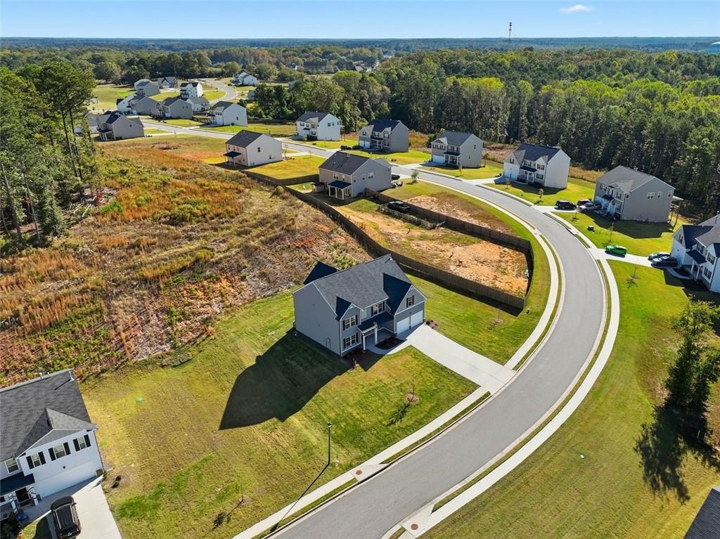 469 Ralph Still Road Dacula, GA 30019 - Photo 4 of 42 a view of swimming pool with lounge chair