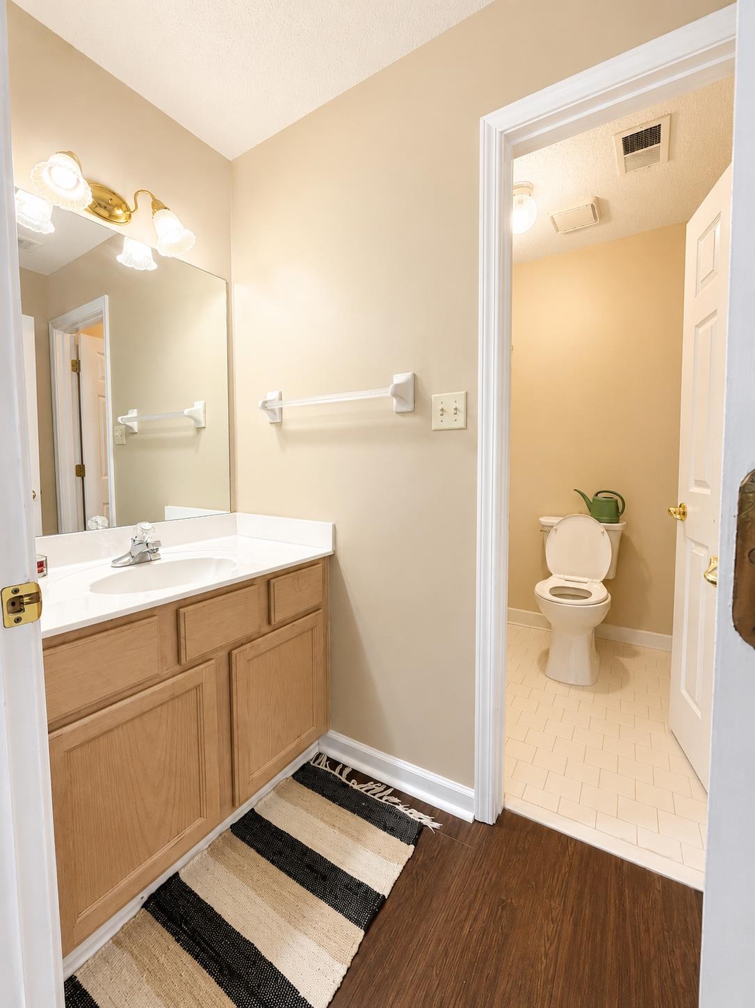 326 South Sanga Road Cordova, TN 38018 - Photo 27 of 32 Upstairs Bathroom vanity with wood cabinetry, white countertop, and integrated sink