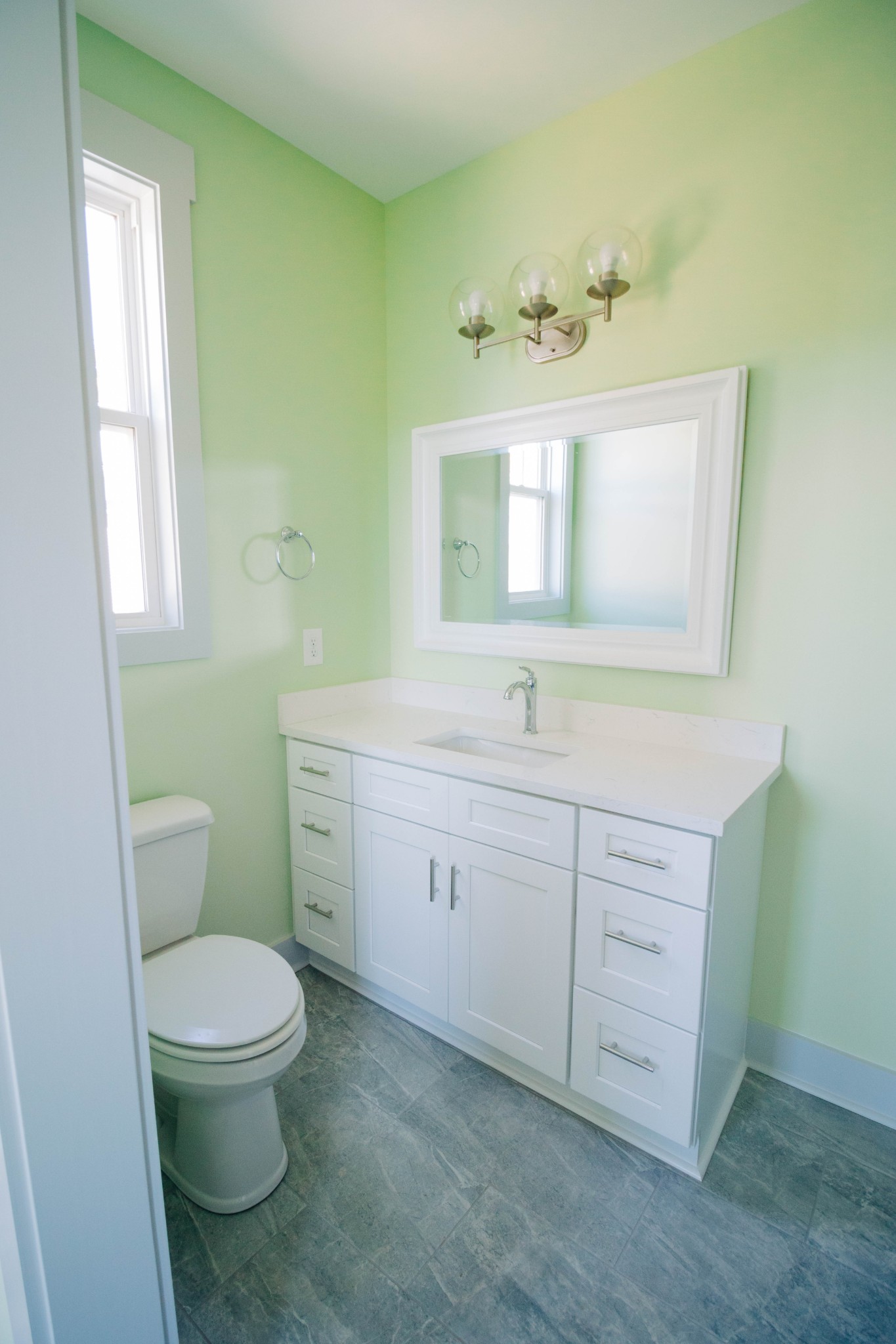 109 North Shephard Street Winchester, TN 37398 - Photo 18 of 25 a bathroom with a toilet sink and mirror