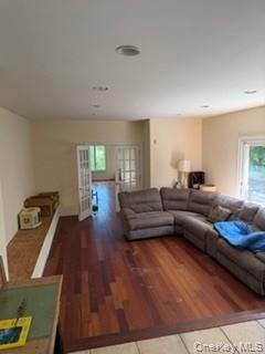 1117 Cedar Ridge Road Oyster Bay, NY 11771 - Photo 6 of 41 a living room with furniture and a wooden floor