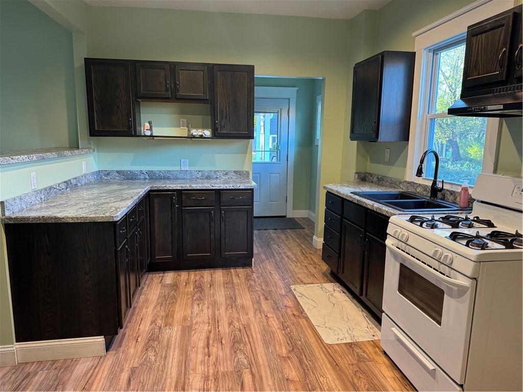 351 North Pitt Street Mercer, PA 16137 - Photo 13 of 39 a kitchen with a stove and a microwave